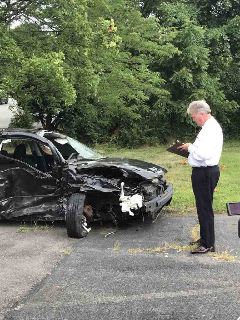 Person protecting their personal injury claim by documenting accident evidence and consulting a lawyer